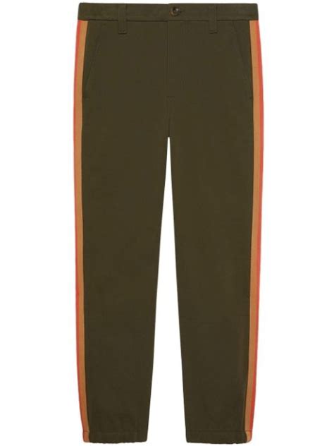 Nuova collezione di pantaloni da uomo di Gucci su FARFETCH